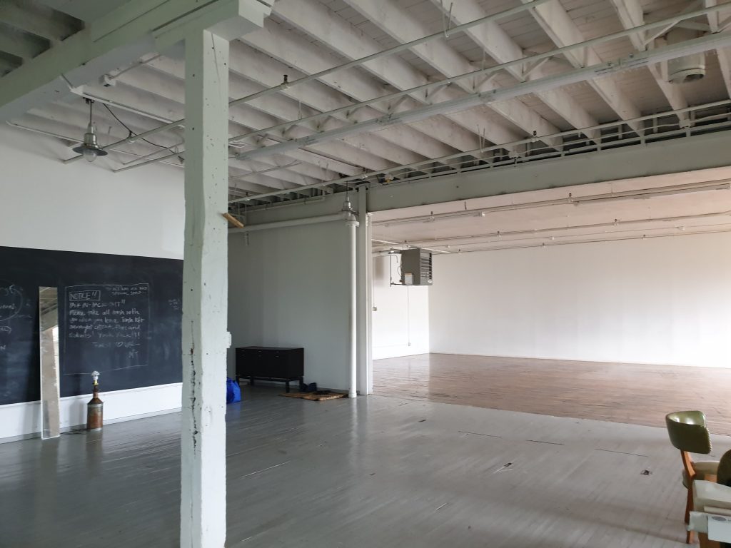 The classroom space shown with only natural lighting